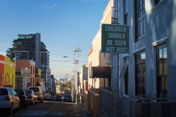 A sign on a narrow cobblestone street In the Bo Kaap district of Cape Town - Copyright JM Schreiber